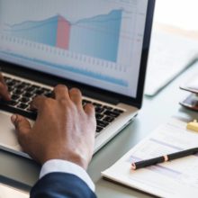 Man Creating Graph On Laptop Featured Image